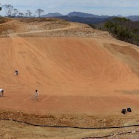 Preparing the heap leach pad